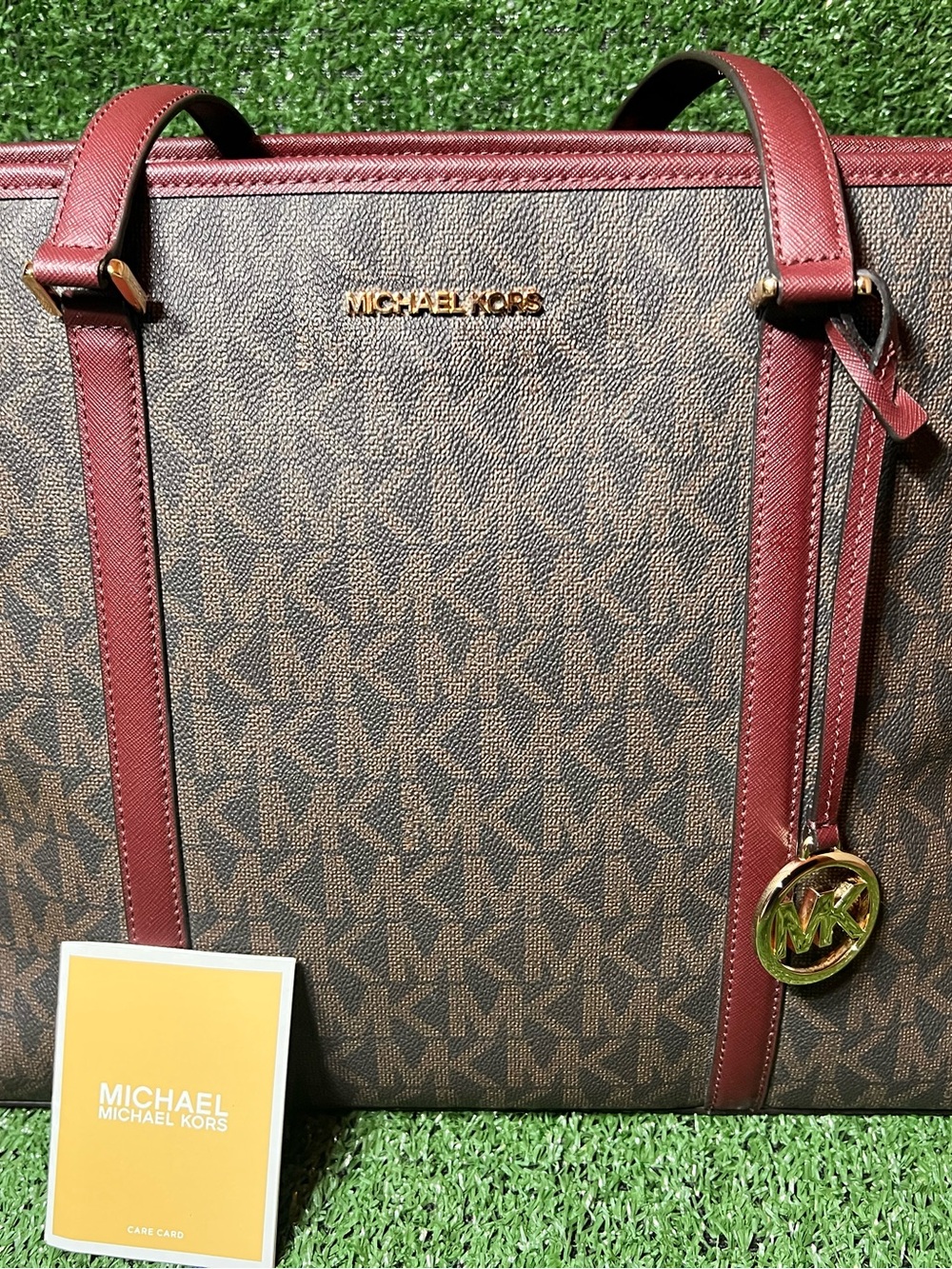 Michael Kors Brown Signature Tote with Burgundy Trim and Gold Hardware